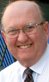 Dr Neville Comins